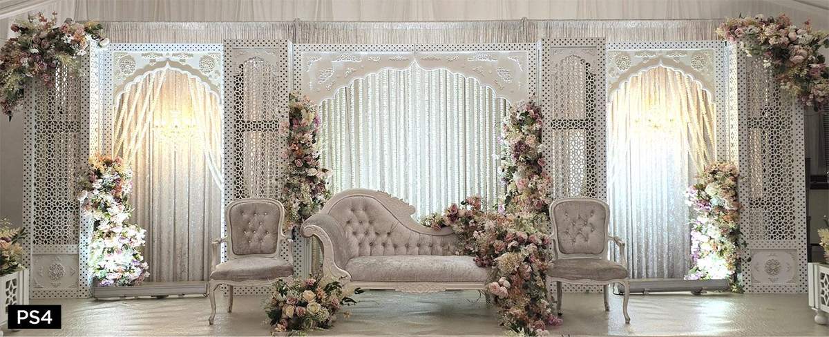 Gold lattice stage with deep floral arch