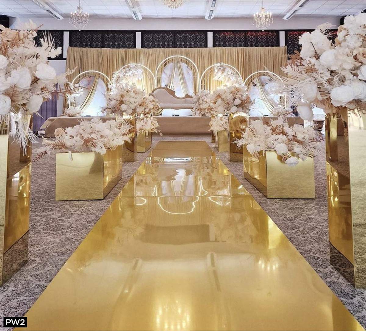 Mirrored gold walkway to the stage