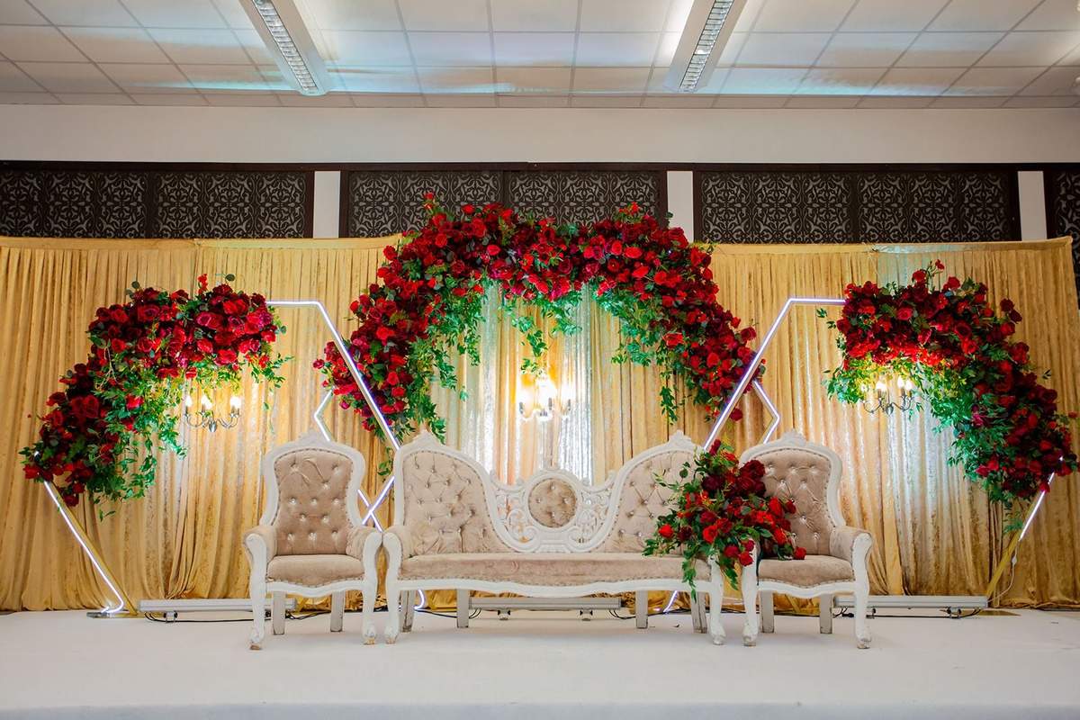 Red rose floral stage and sofa