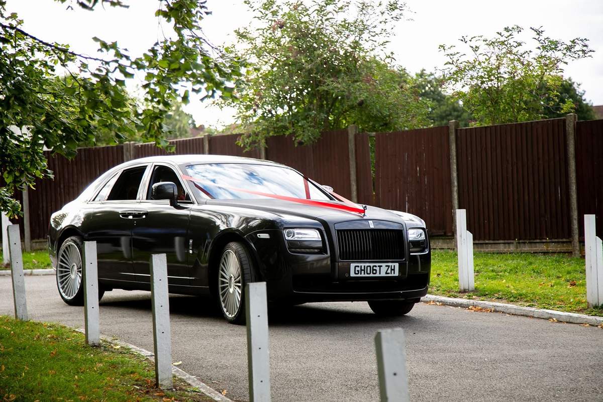 Rolls-Royce on the venue forecourt at dusk