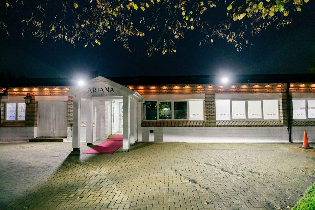 Night arrival with red carpet at the front doors